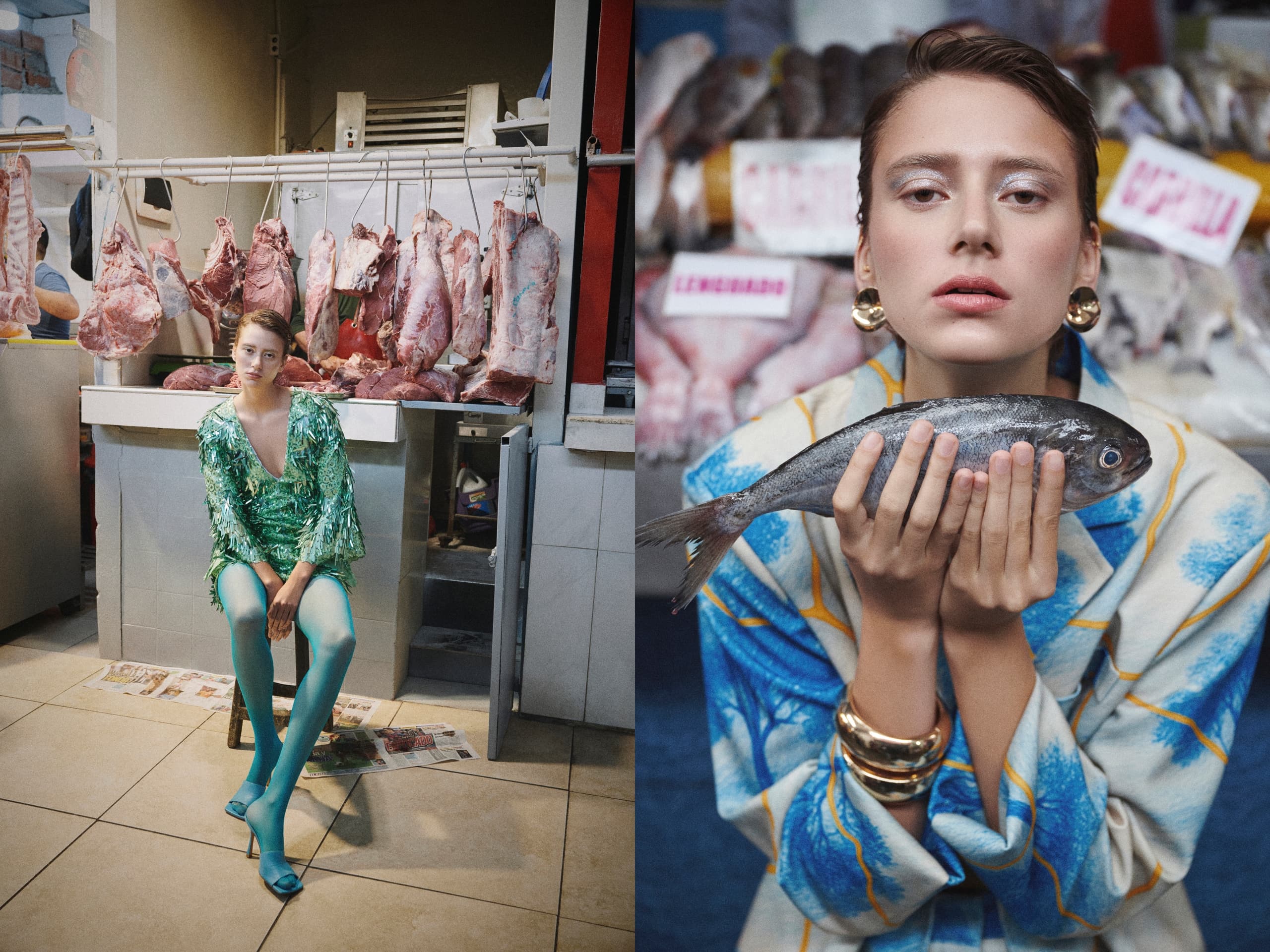 Fashion model in green dress at butcher shop and holding a fish in front of market.