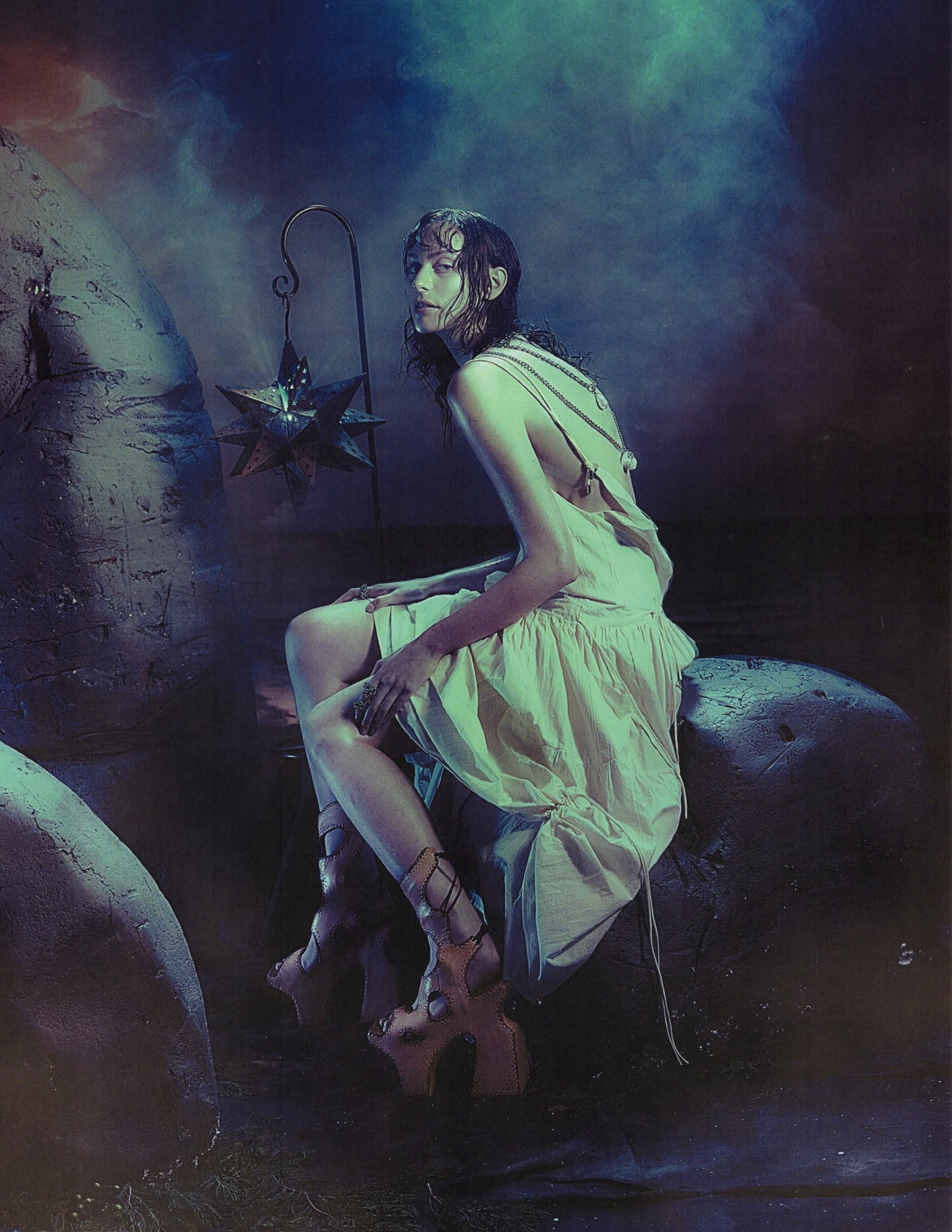 Mystical scene: woman in white dress, dramatic lighting, star lantern, ethereal vibe.