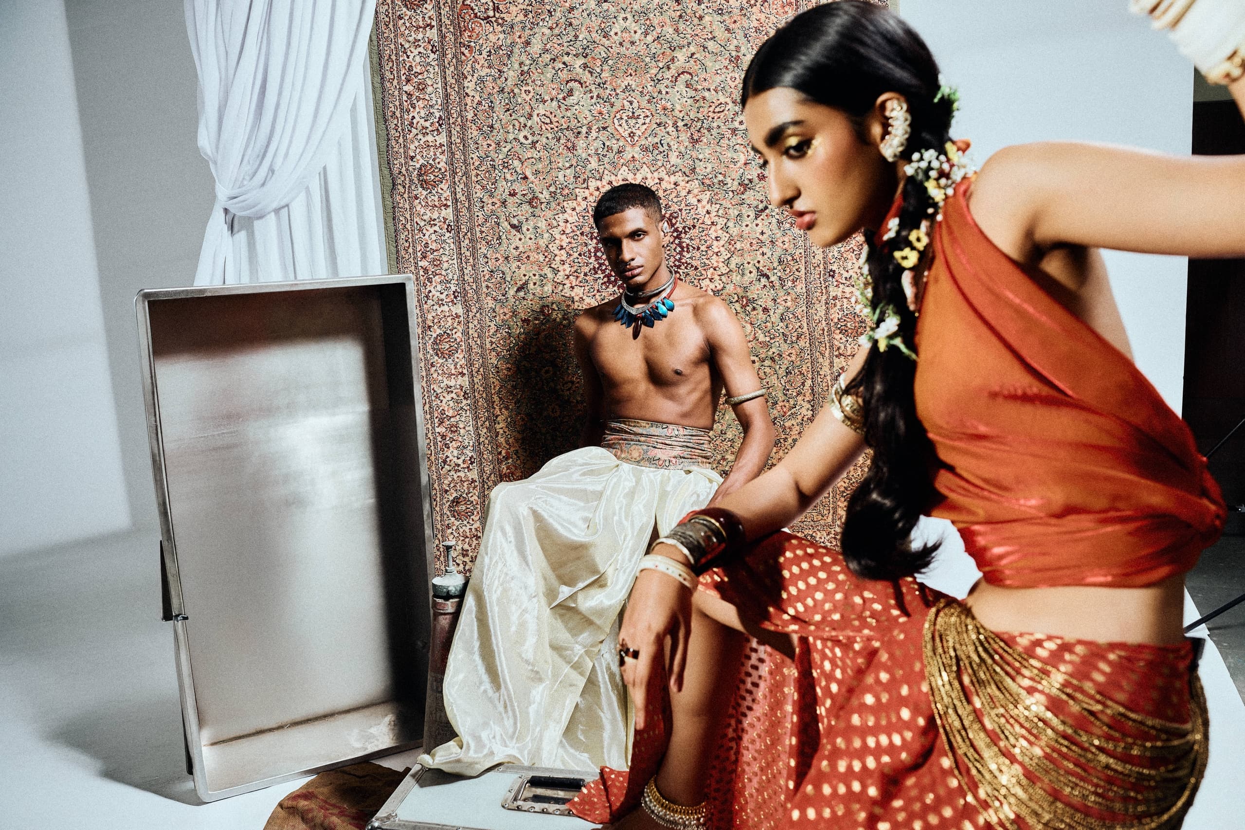 Fashion shoot with cultural attire, vibrant patterns, and intricate accessories.