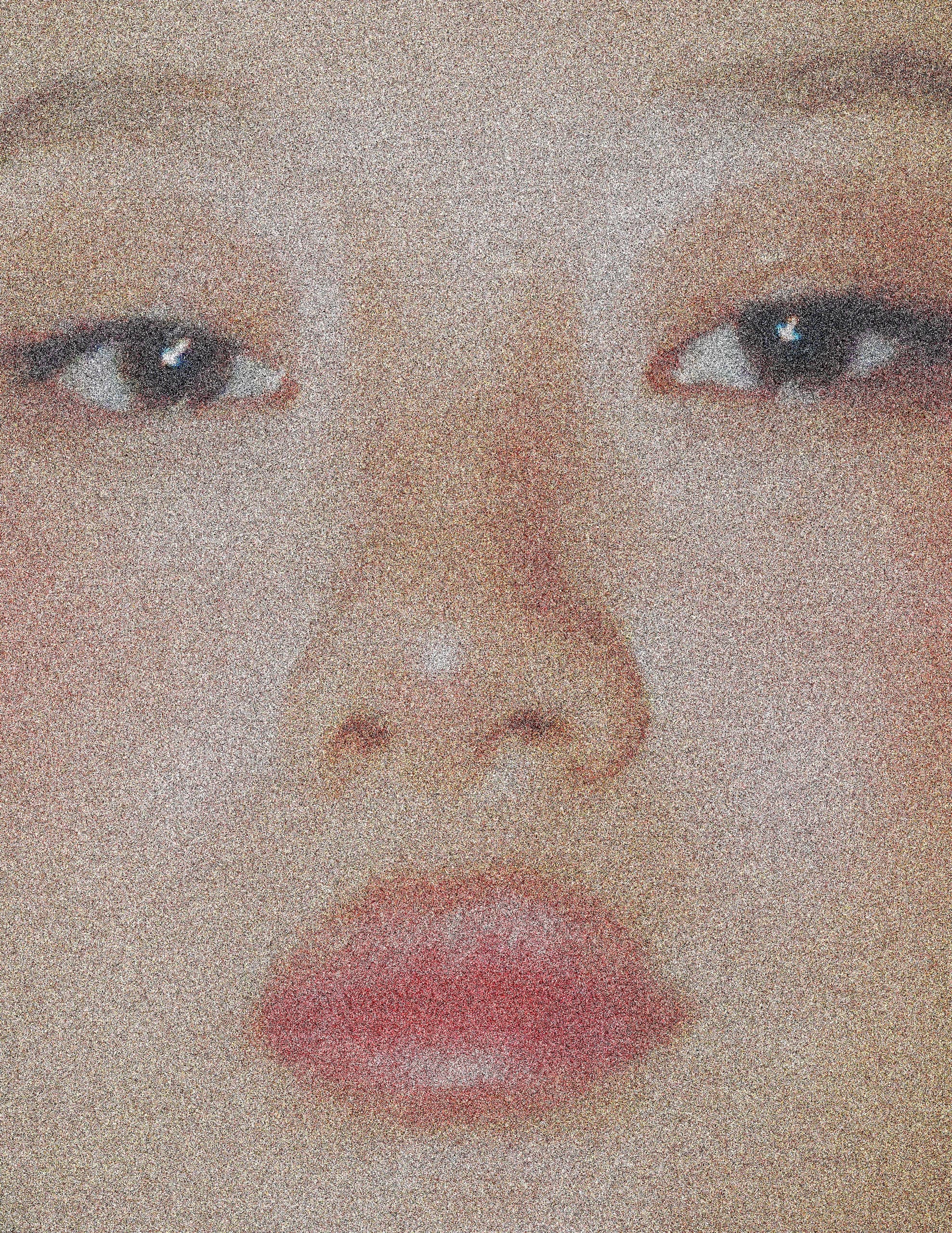 Close-up of a grainy, artistic portrait focusing on eyes and lips.