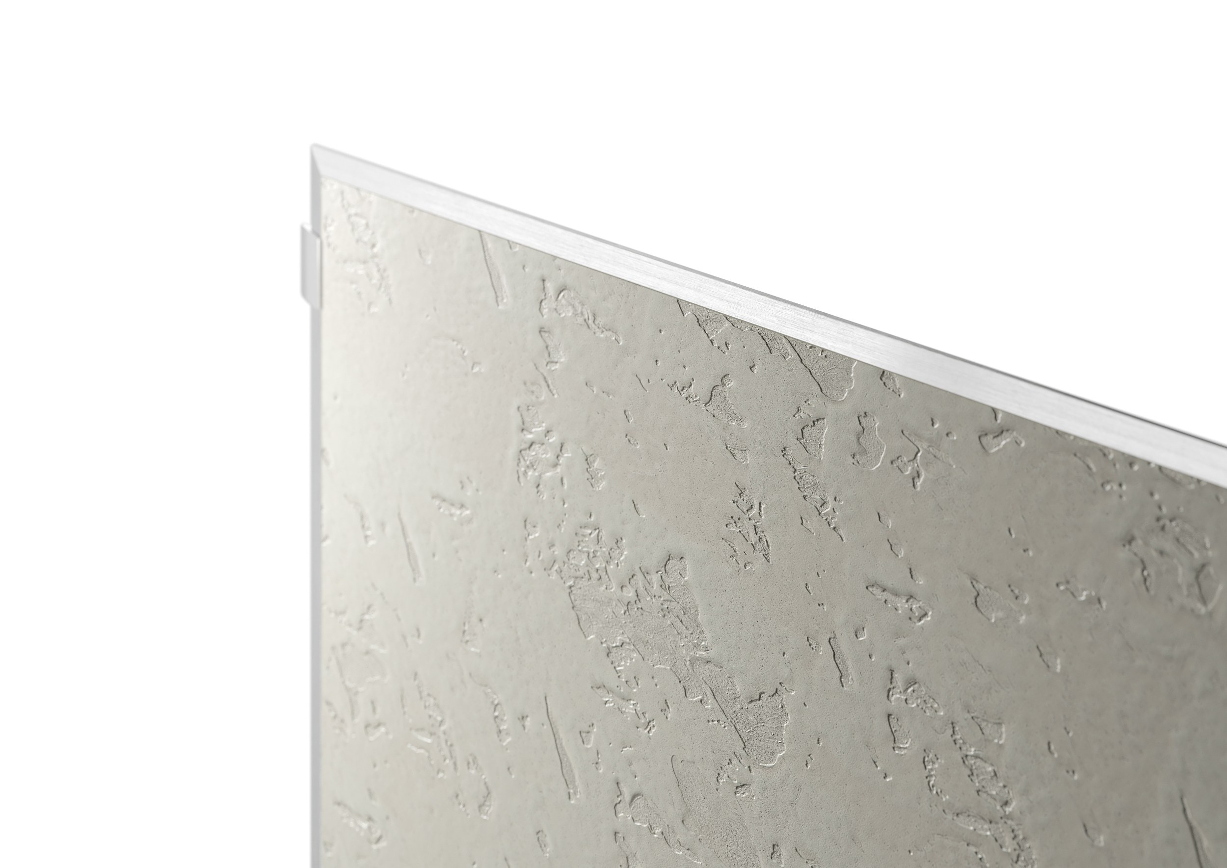 Close-up of textured, beige panel corner with metal trim.
