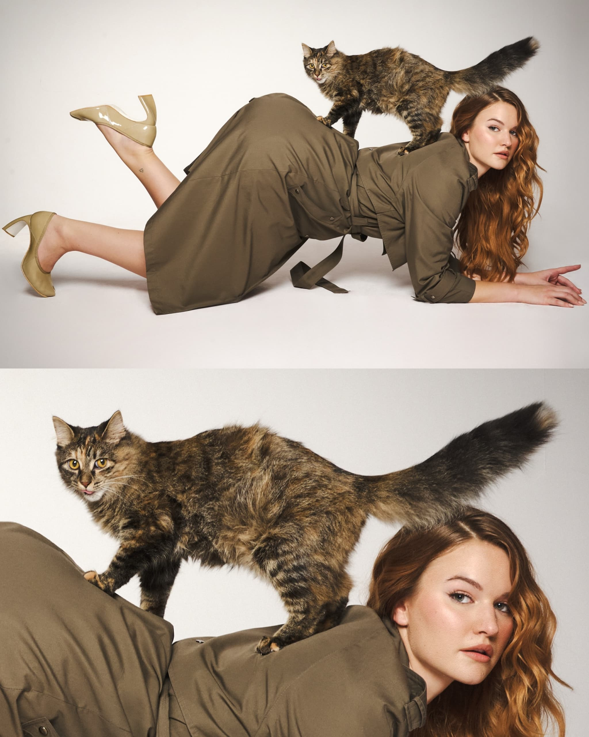 Woman in trench coat posing with a cat on her back, fashion and pets concept.