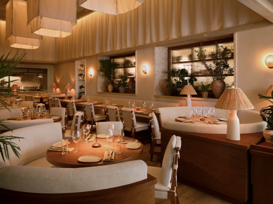 Cozy restaurant interior with elegant decor and ambient lighting.