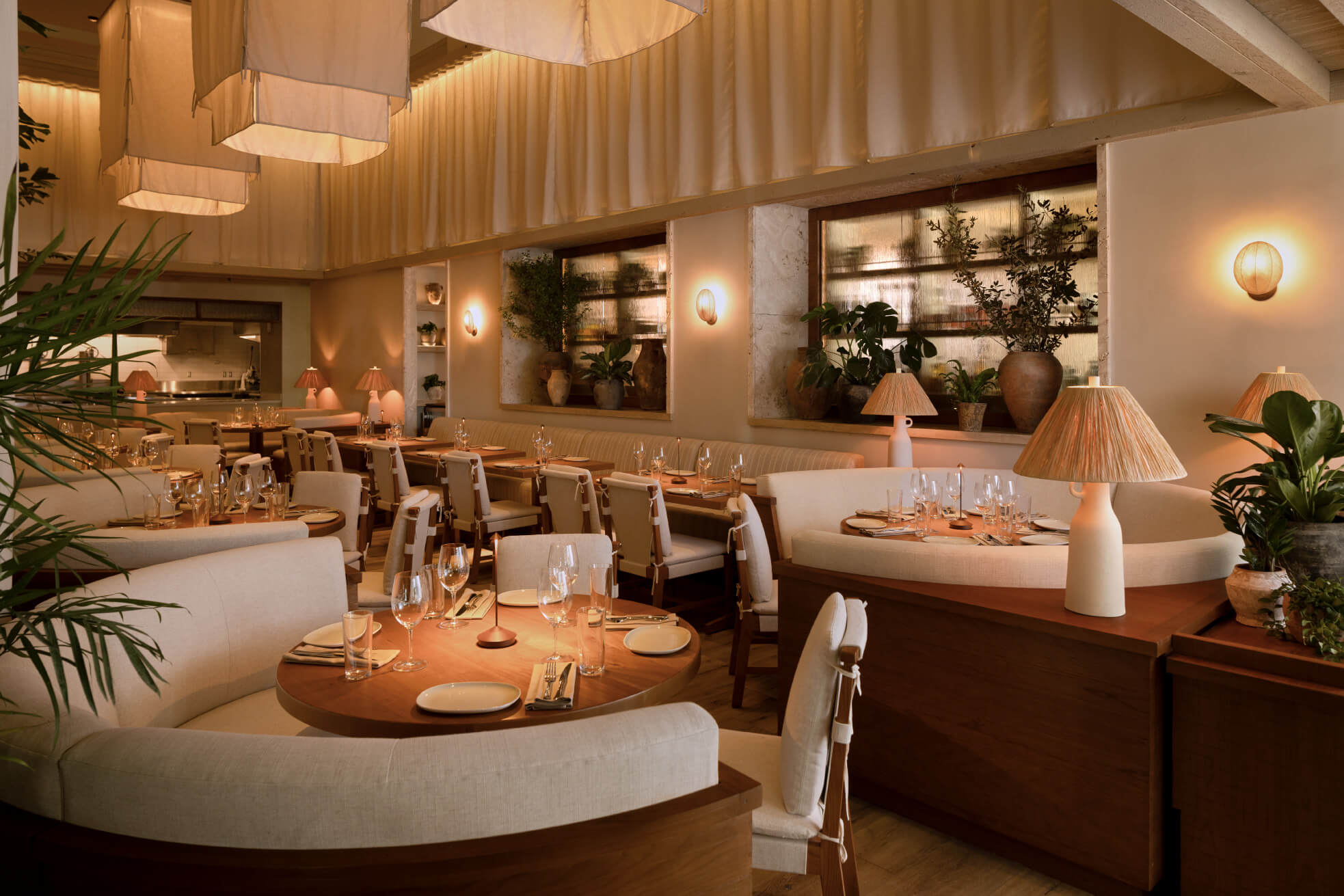 Cozy restaurant interior with elegant decor and ambient lighting.