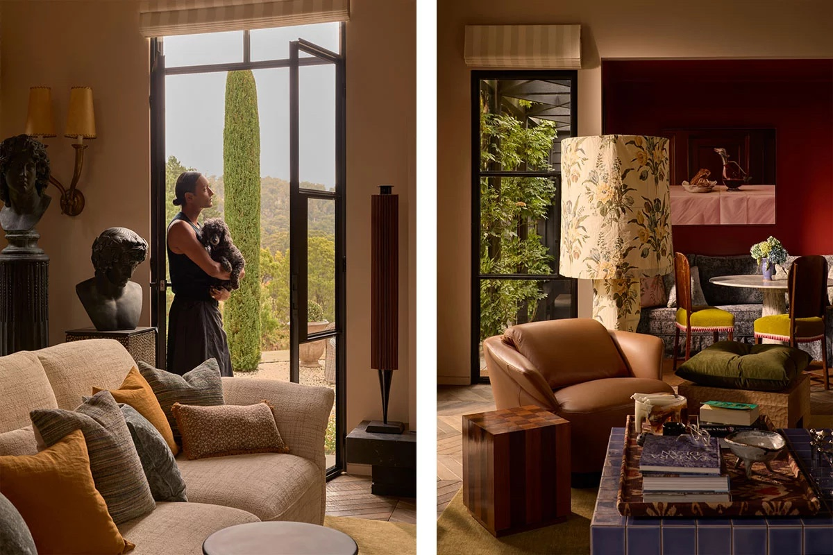Stylish living room with modern decor and person enjoying the view.