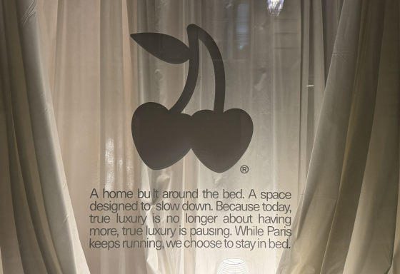 Cherry logo with luxury home text on sheer curtains.