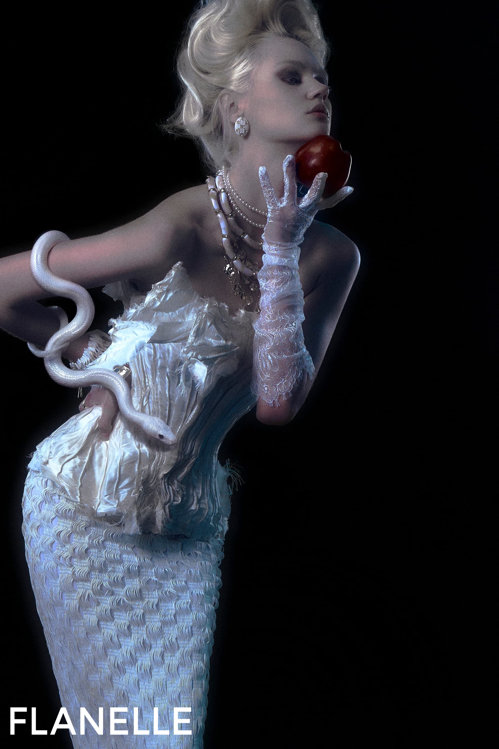 Elegant model in white dress with snake and apple, Flanelle fashion shoot.