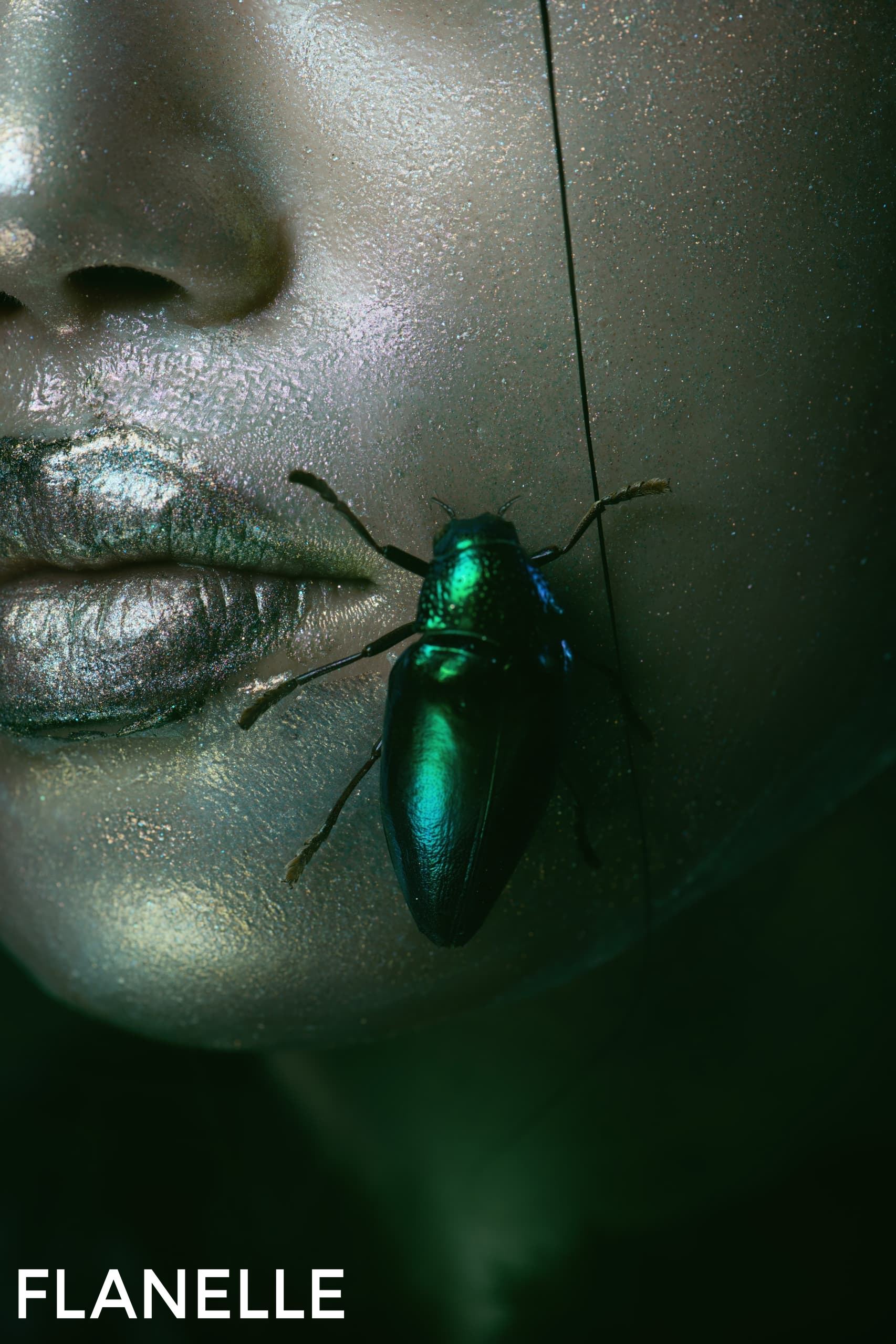 Metallic green beetle on shimmery makeup face, close-up.