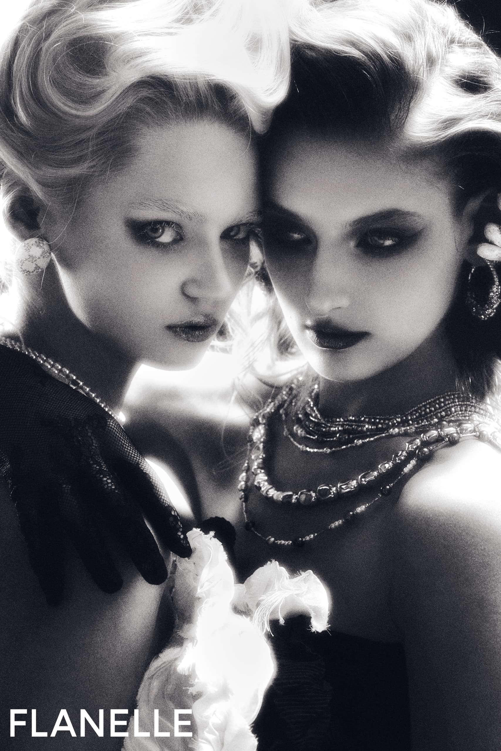 Vintage glamour fashion models in black and white portrait for Flanelle magazine.