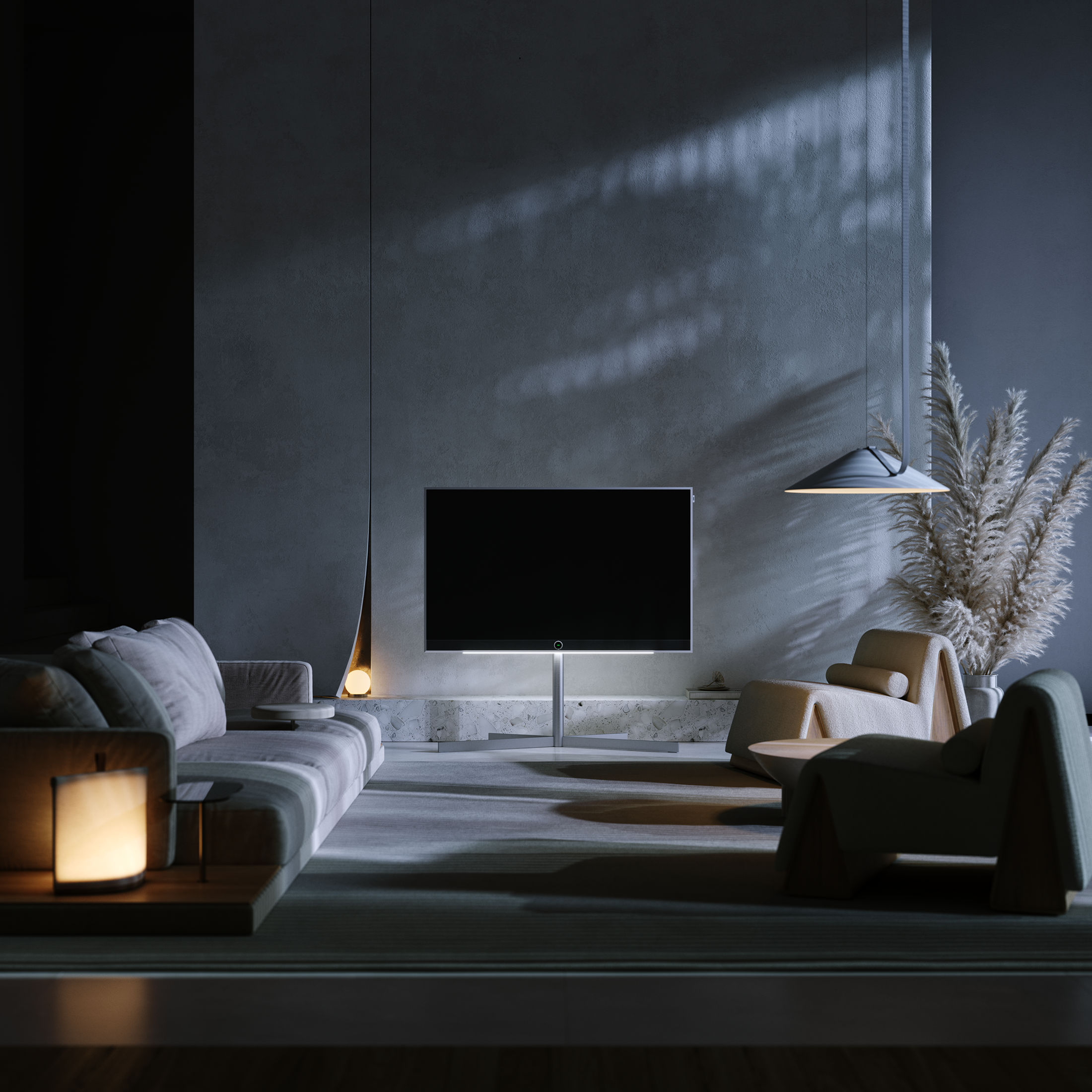 Modern minimalist living room with cozy seating and large TV.
