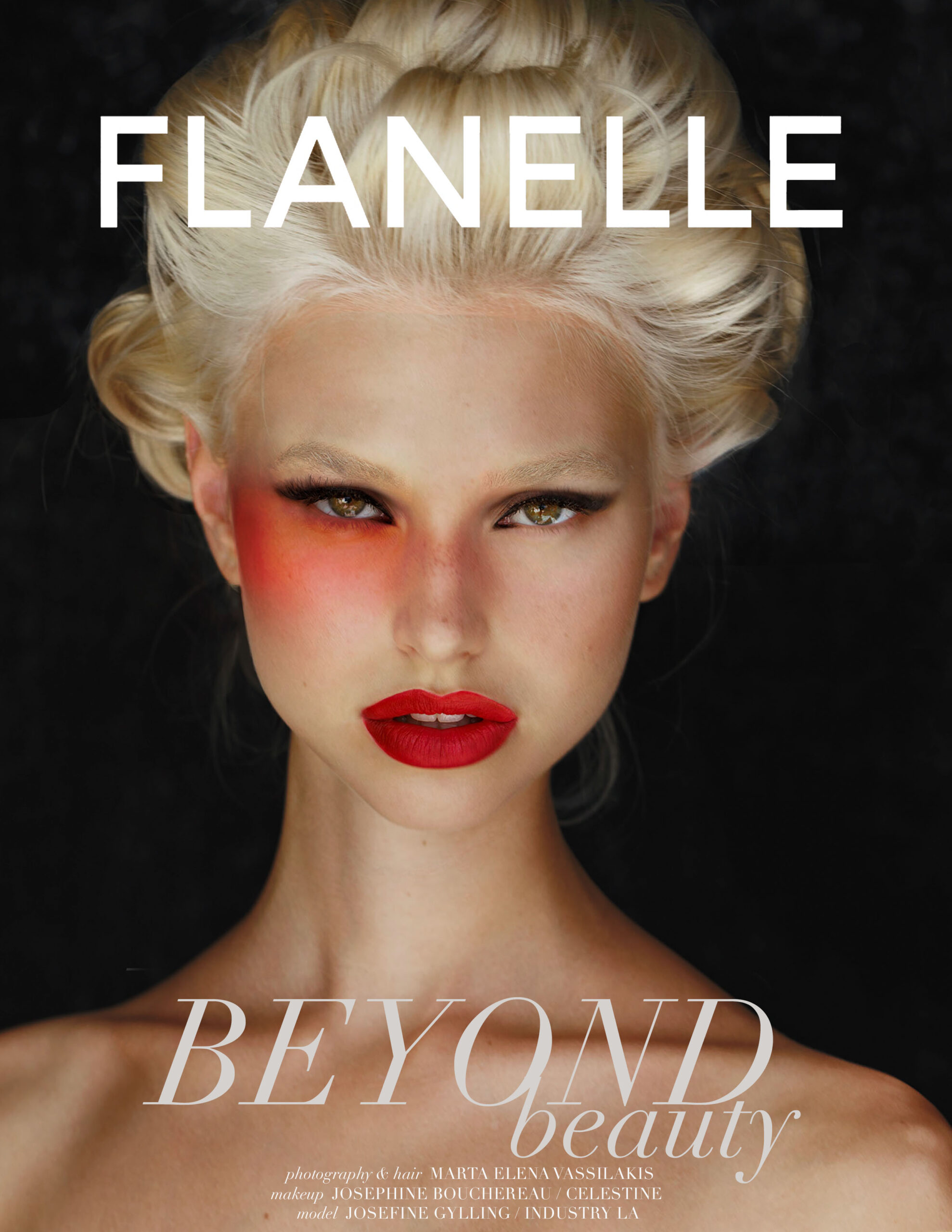 Model with bold makeup on Flanelle magazine cover.