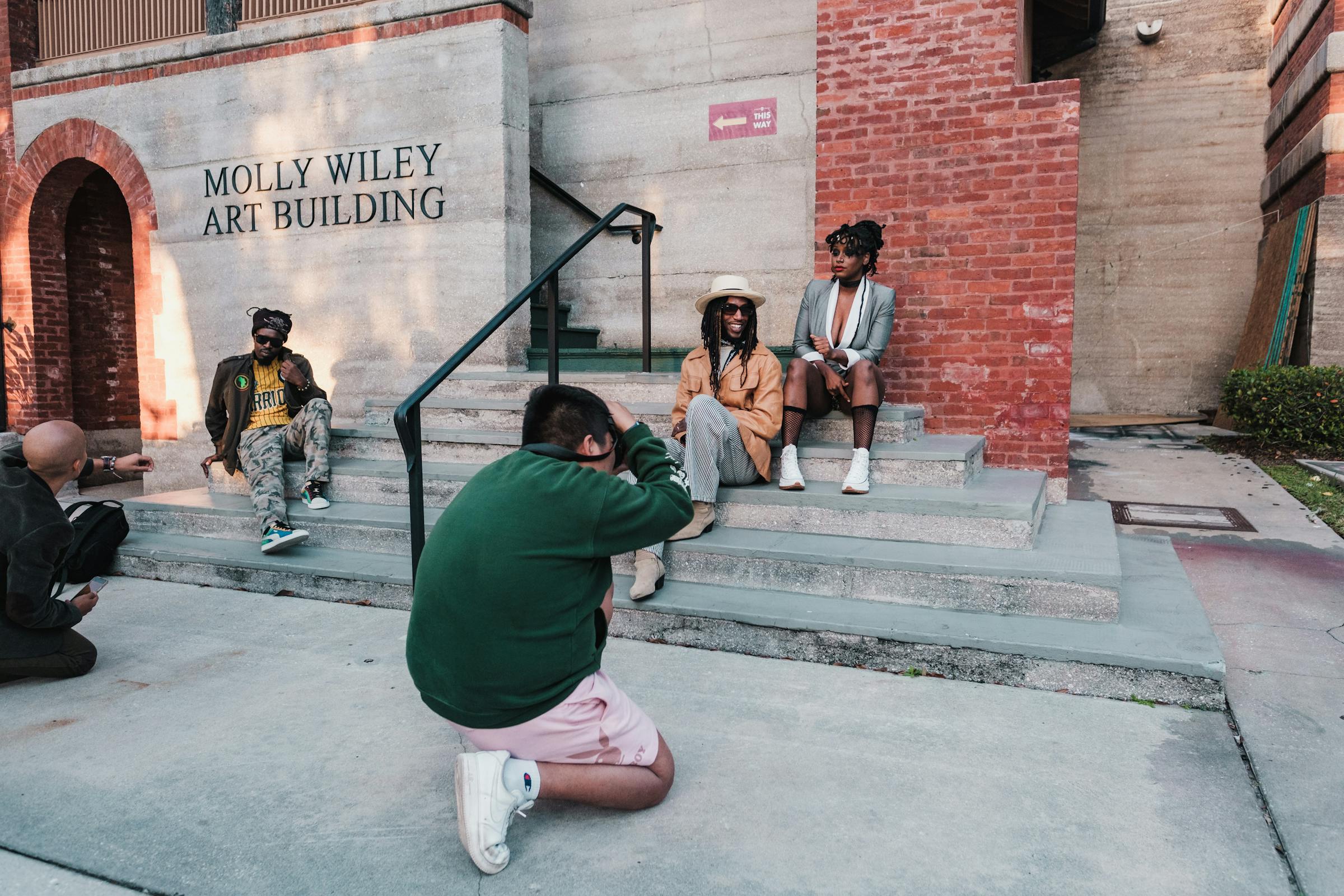 Group photo shoot outside Molly Wiley Art Building.